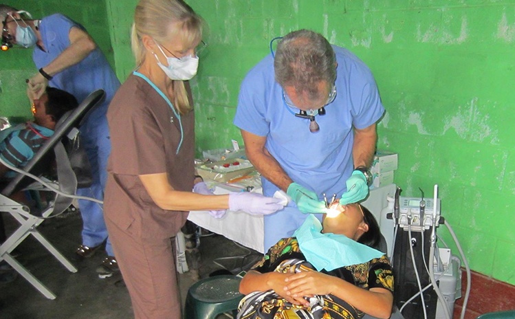Mission trip patient receiving care