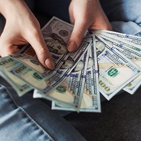 Woman counting cash