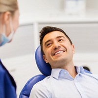 smiling patient going through the dental crowns process