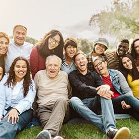 Group of people outside taking a photo together