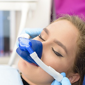 Woman with nitrous oxide mask