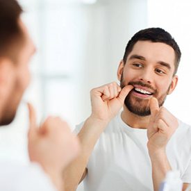 a man flossing