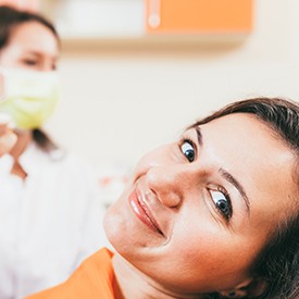 patient smiling in dental chair