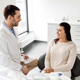 Woman at dentist for teeth whitening in Mesquite