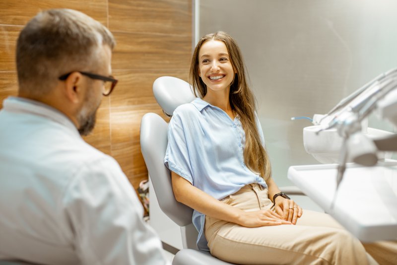 Patient talking to a cosmetic dentist