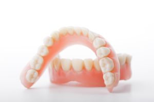 Model showing the cost of dentures in Garland