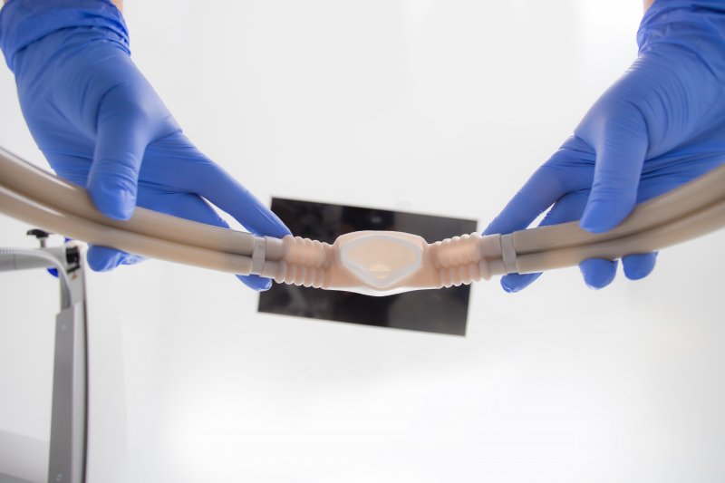 pov shot of a nitrous oxide mask being placed